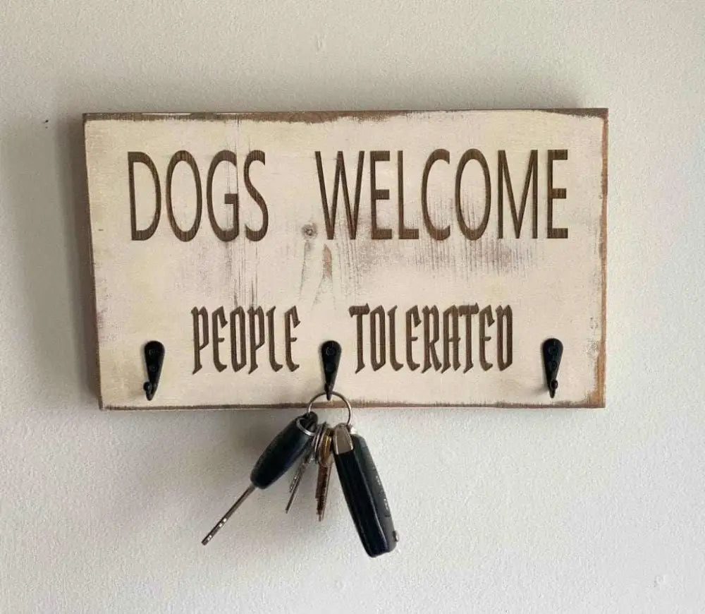 Dog Lover's Wall Mount Keychain Holder with 'Dogs Welcome - People Tolerated' message, featuring three hooks for keys and accessories.