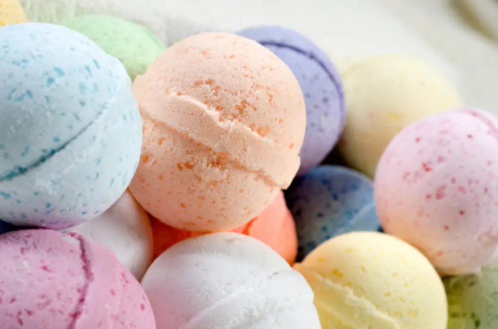 Colorful Epsom salt bath bombs in various pastel shades for mess-free relaxation and skin soothing benefits.
