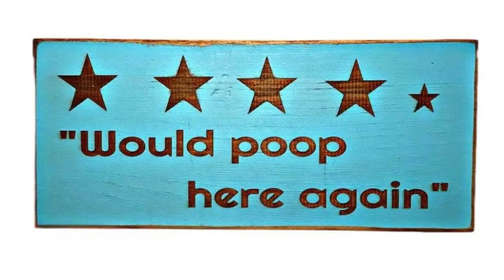 Rustic bathroom sign with humorous "Would Poop Here Again" slogan and star rating design.