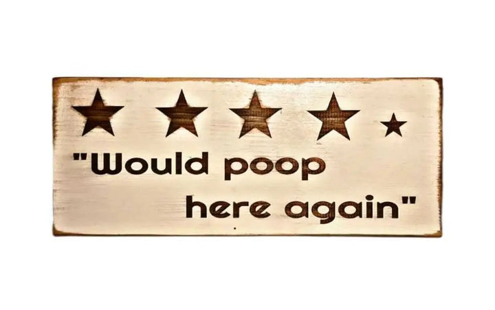 Rustic humorous bathroom sign with "Would Poop Here Again" slogan and star rating.