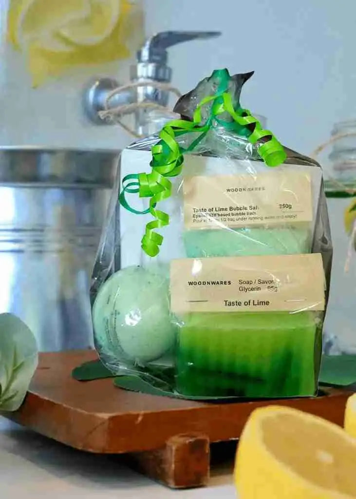Green soap bar with lemon scent and packaging.