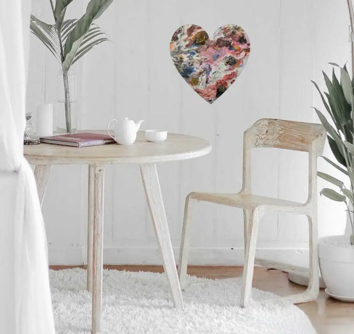 Handcrafted artisan wooden hearts wall art decor in a minimalist room setting.