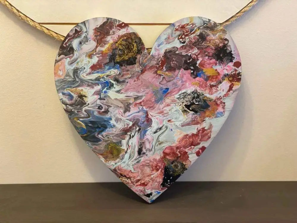 Handcrafted artisan wooden hearts wall art with multicolor acrylic paint design.