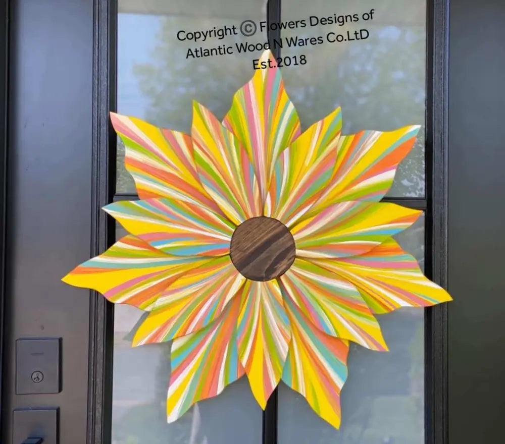 Handcrafted Love Flower Door Decoration in vibrant spring colors with a gold center, 22x22 inches.