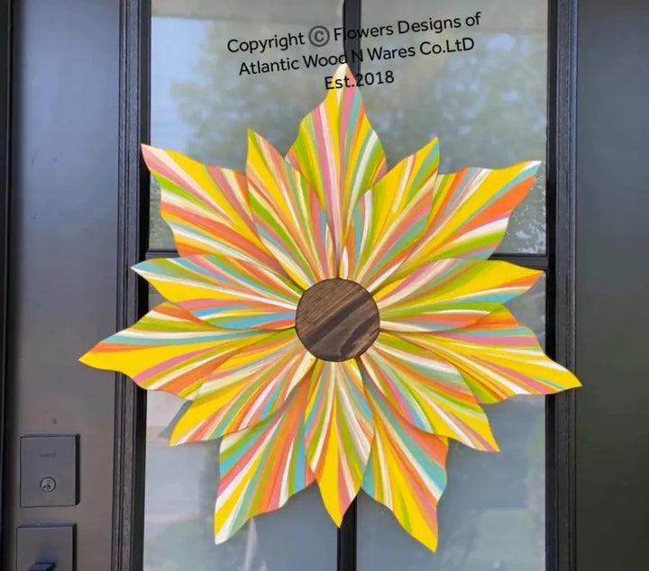 Handcrafted Love Flower Door Decoration in vibrant spring colors with a gold center, 22x22 inches.