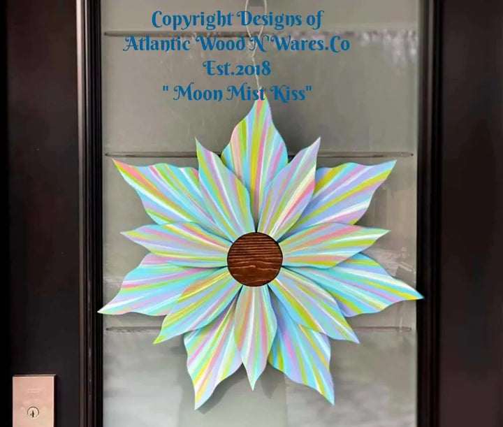 Handcrafted wooden flower door decoration with colorful petals and gold center, suitable for all seasons.