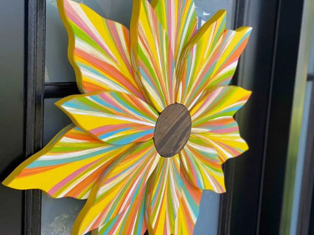 Handcrafted Love Flower Door Decoration with colorful petals and wooden center for all seasons.