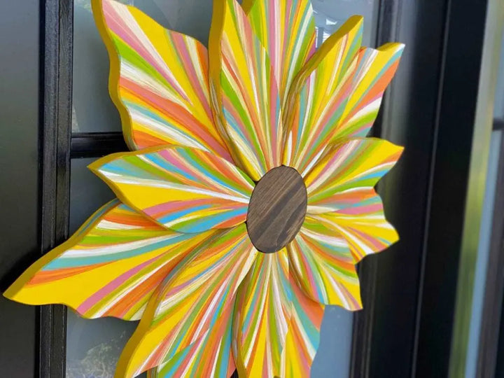 Handcrafted Love Flower Door Decoration with colorful petals and wooden center for all seasons.