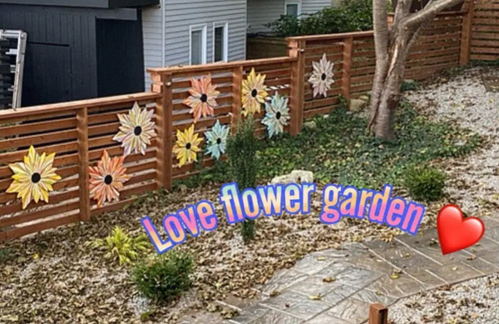 Handcrafted Love Flower Door Decorations on a wooden fence, colorful floral art.
