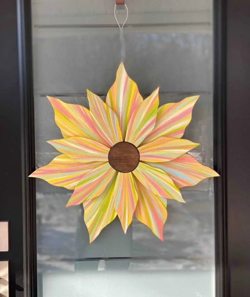 Handcrafted Love Flower Door Decoration with multicolored petals and gold center, 22x22 inches, suitable for all seasons.