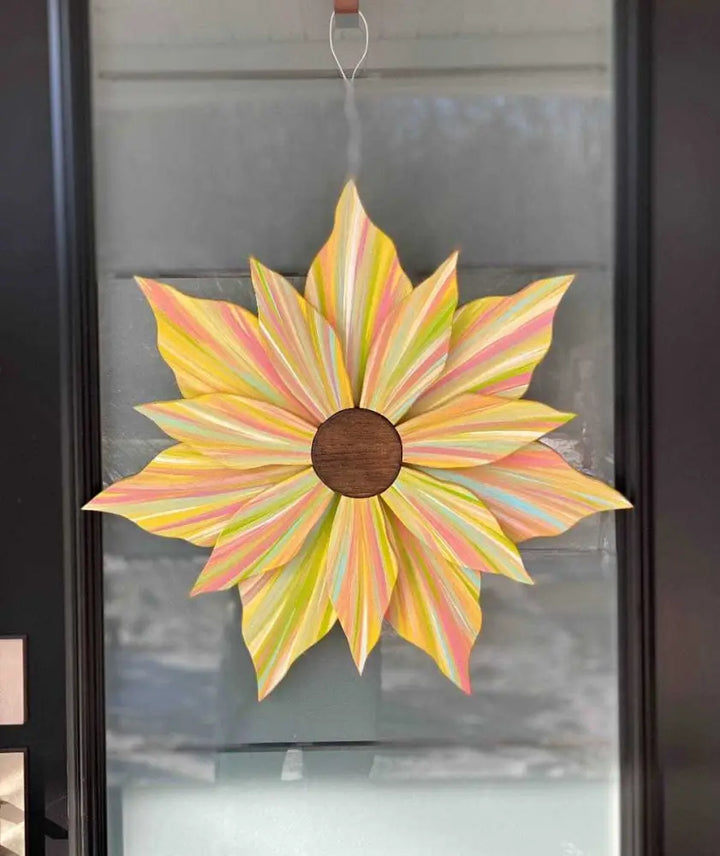 Handcrafted Love Flower Door Decoration with multicolored petals and gold center, 22x22 inches, suitable for all seasons.