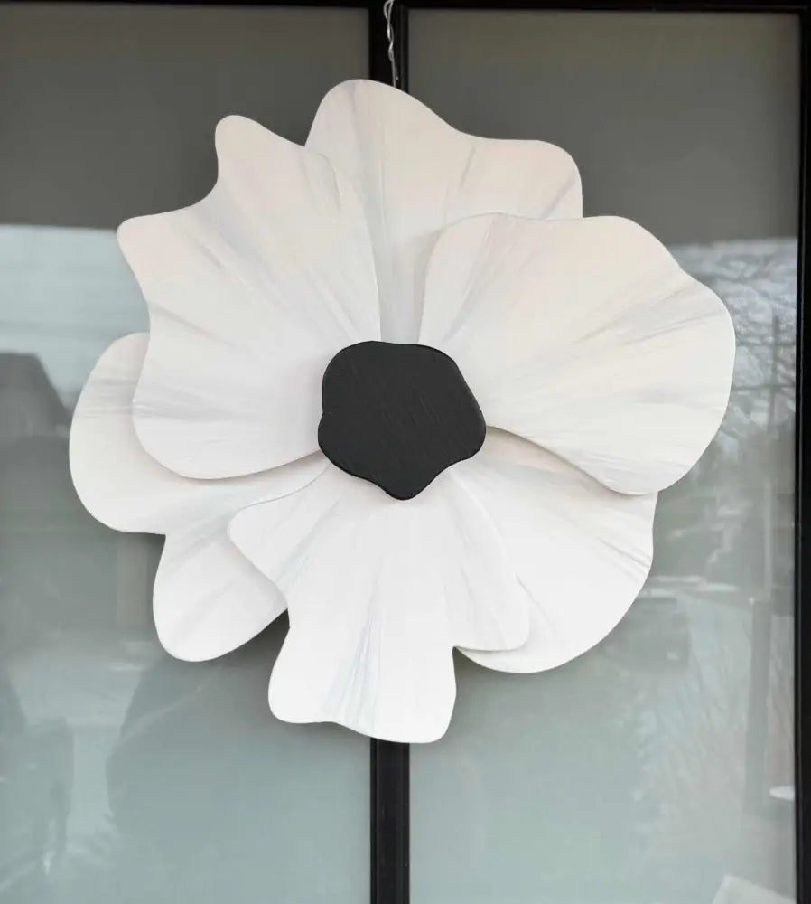 White pine wood windflower door decoration with black center and durable wire hanger for indoor or outdoor use