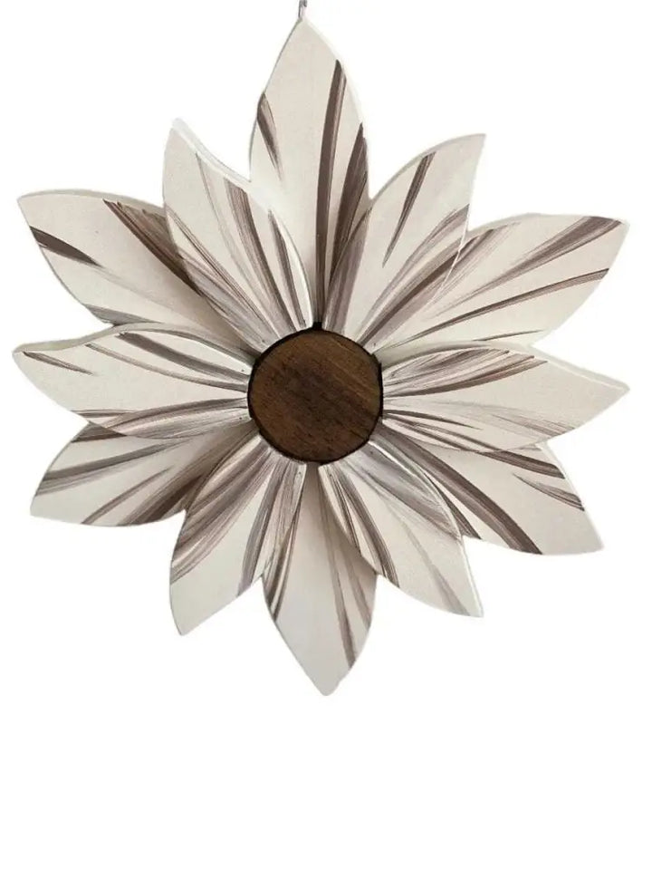 Wooden flower art piece with lifelike painted petals and stained center for home decoration.