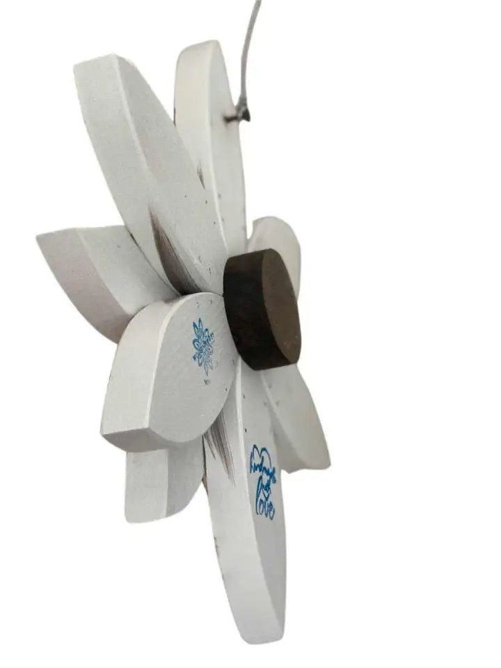 Elegant wooden flower art piece with a handcrafted design and rich stained center, perfect for home decor.