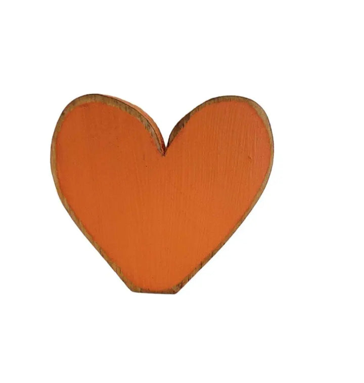Handcrafted orange wooden heart, perfect for gifts and home decor.