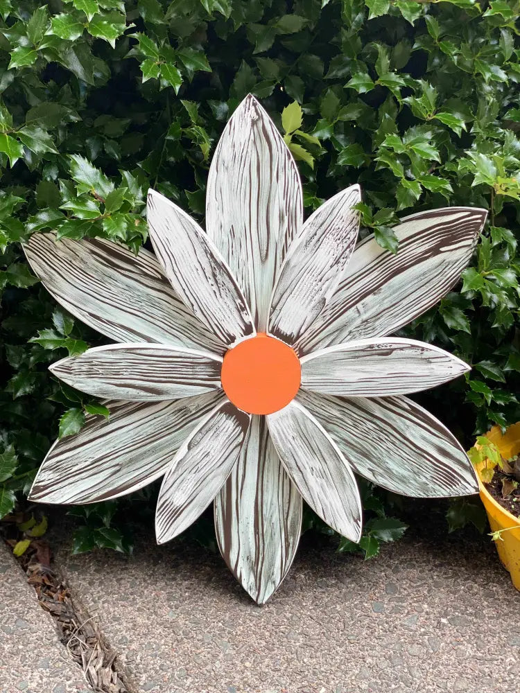 Handcrafted zebra-themed wooden flower with chocolate brown and white stripes for home decor.