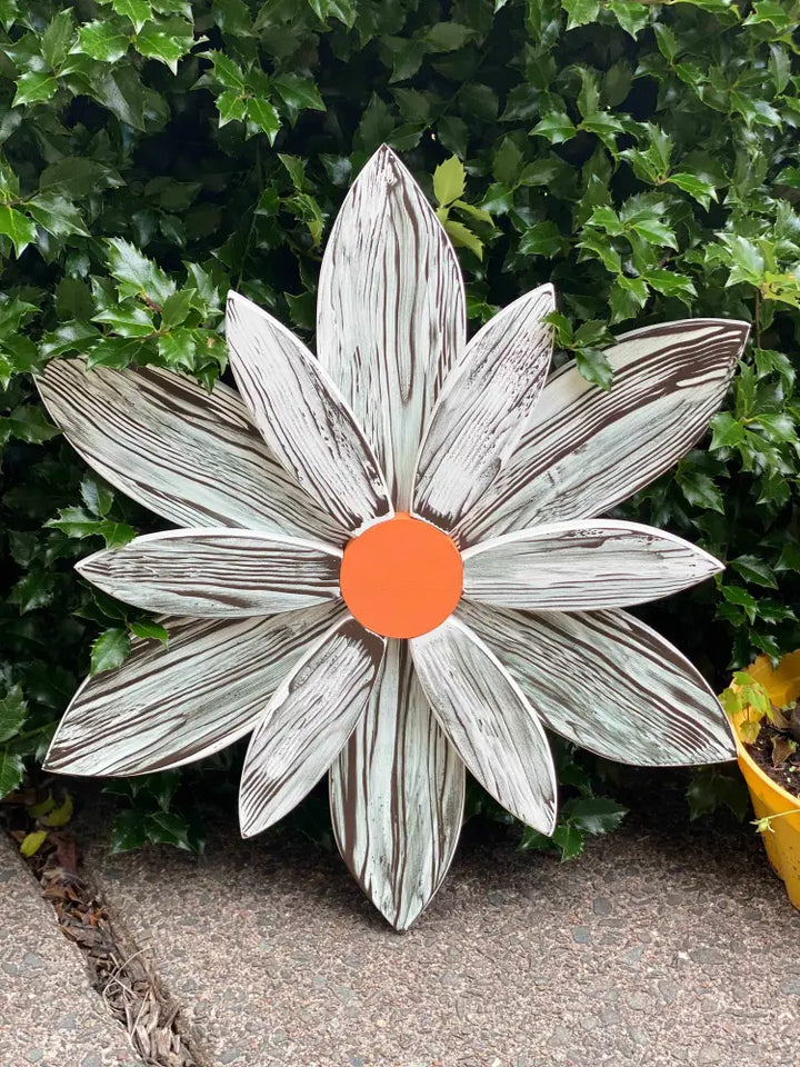 Handcrafted zebra-themed wooden flower with chocolate brown and white stripes for home decor.