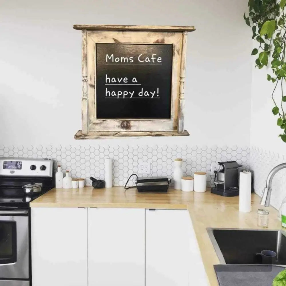 Handmade wooden chalkboard with spindle design hanging in a kitchen.