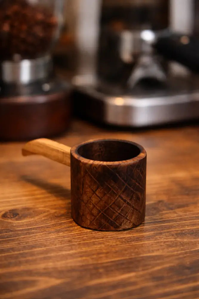 Handmade rustic wooden coffee scoop with diamond pattern