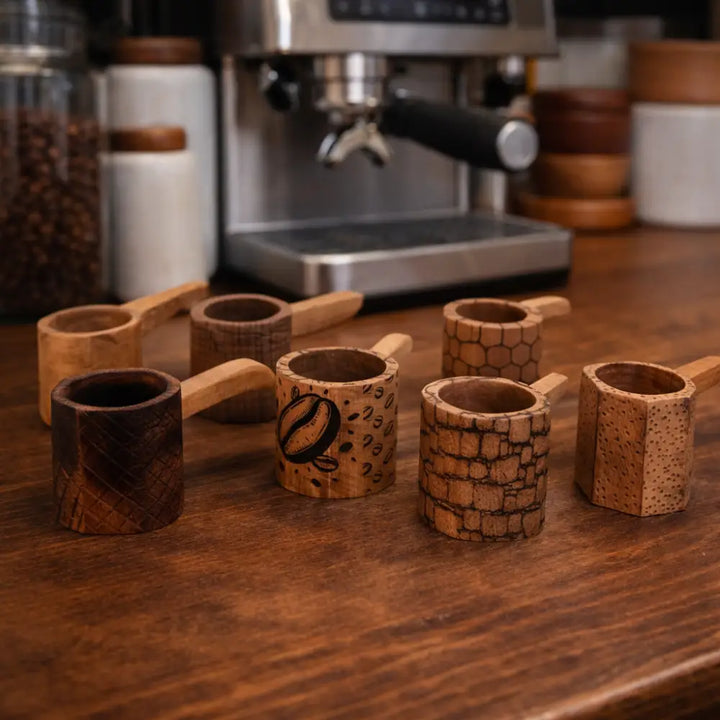 Handmade rustic wooden coffee scoop with bean motif and honeycomb texture