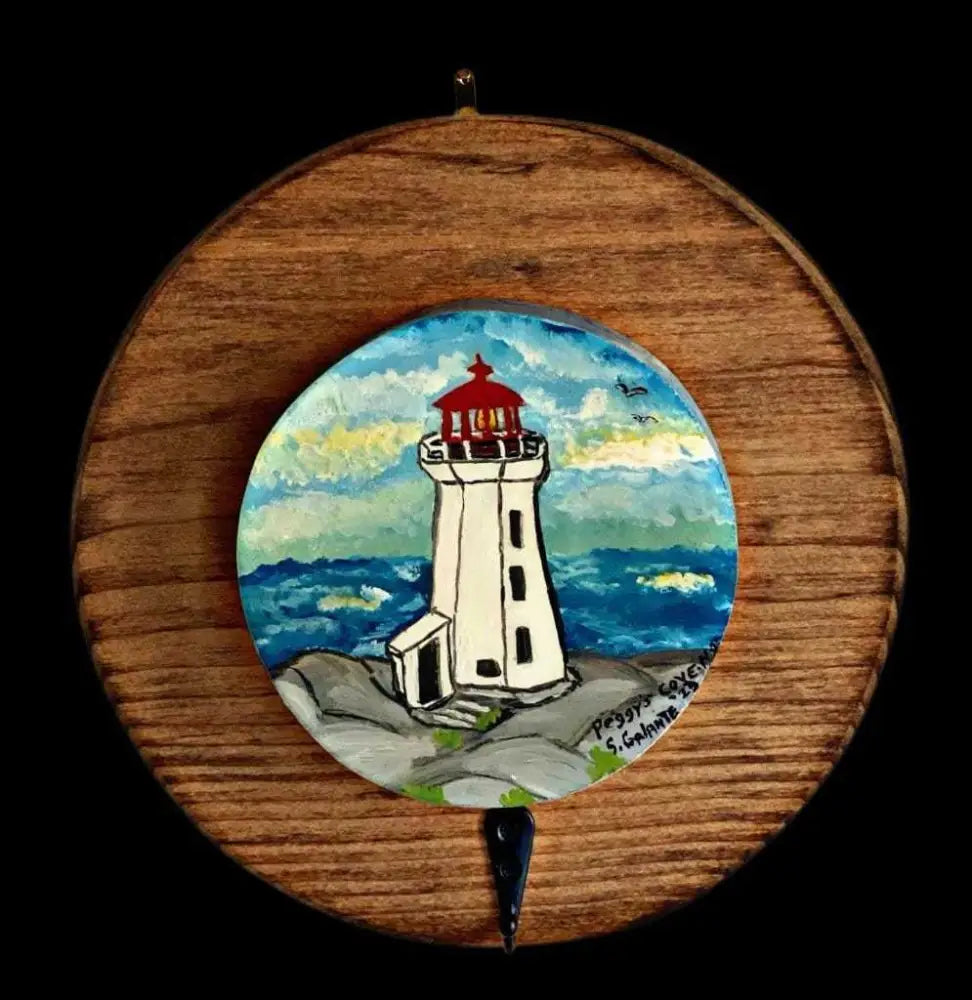 Key chain holder with Peggy’s Cove lighthouse painting, handcrafted resin art, wooden base, 7.25 inches diameter.
