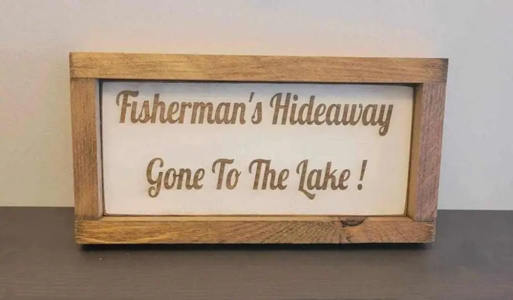 Laser engraved wood sign for outdoor lovers reading "Fisherman's Hideaway Gone To The Lake".