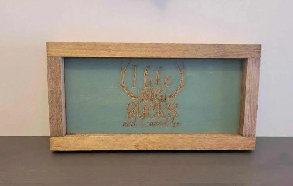 Laser engraved wood sign with antler design, ideal gift for hunters and outdoor enthusiasts.