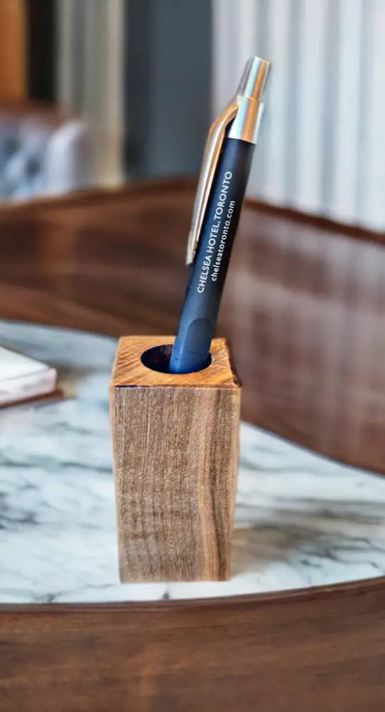 Handcrafted Maple wooden pen holder on desk with sleek design.