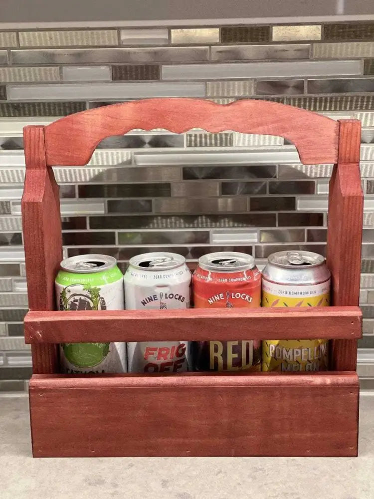 Rustic Beer Caddy holding four cans, handcrafted from solid pine wood.