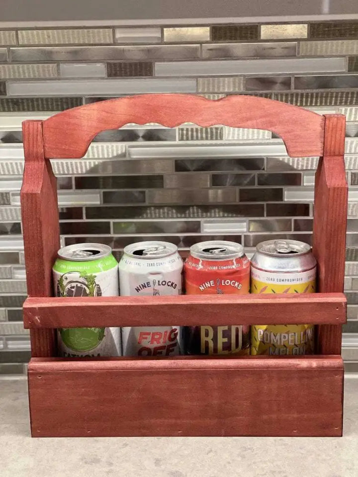 Rustic Beer Caddy holding four cans, handcrafted from solid pine wood.