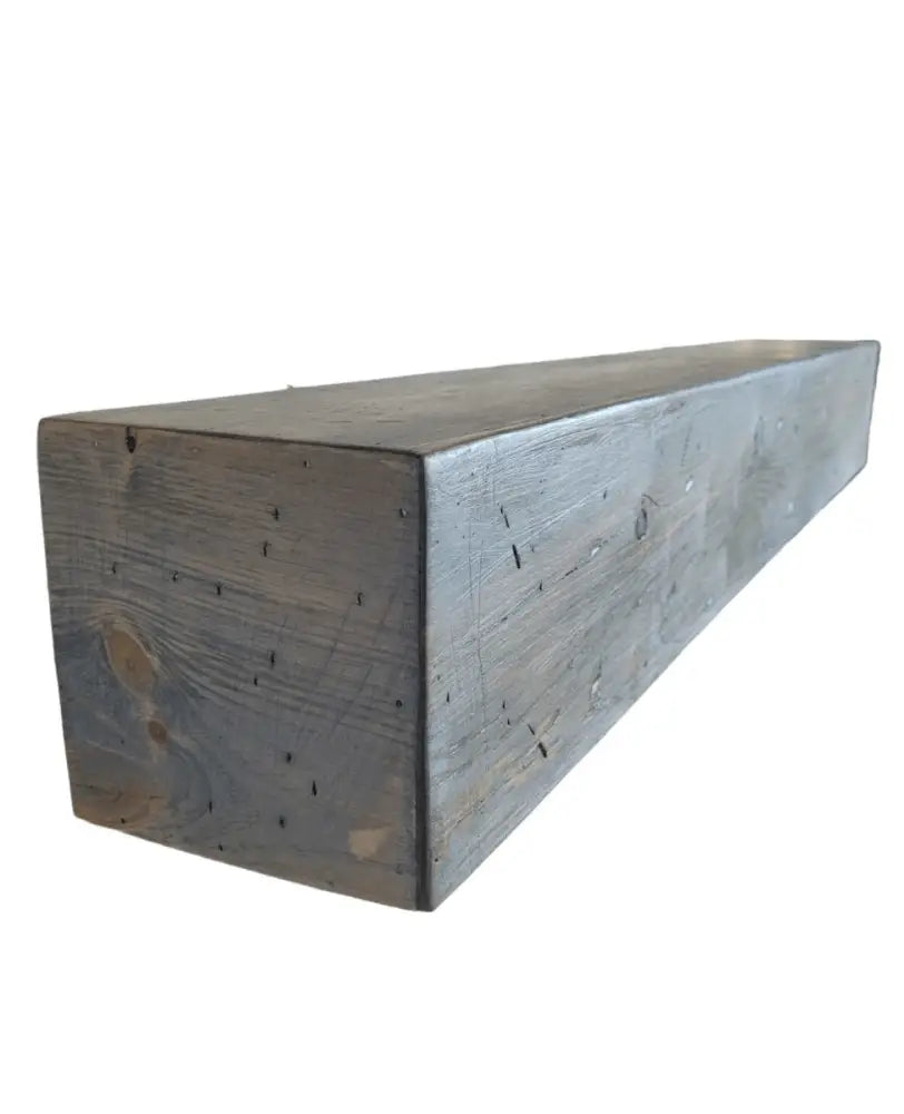 Rustic wood fireplace mantel in classic grey finish, handcrafted in Canada.