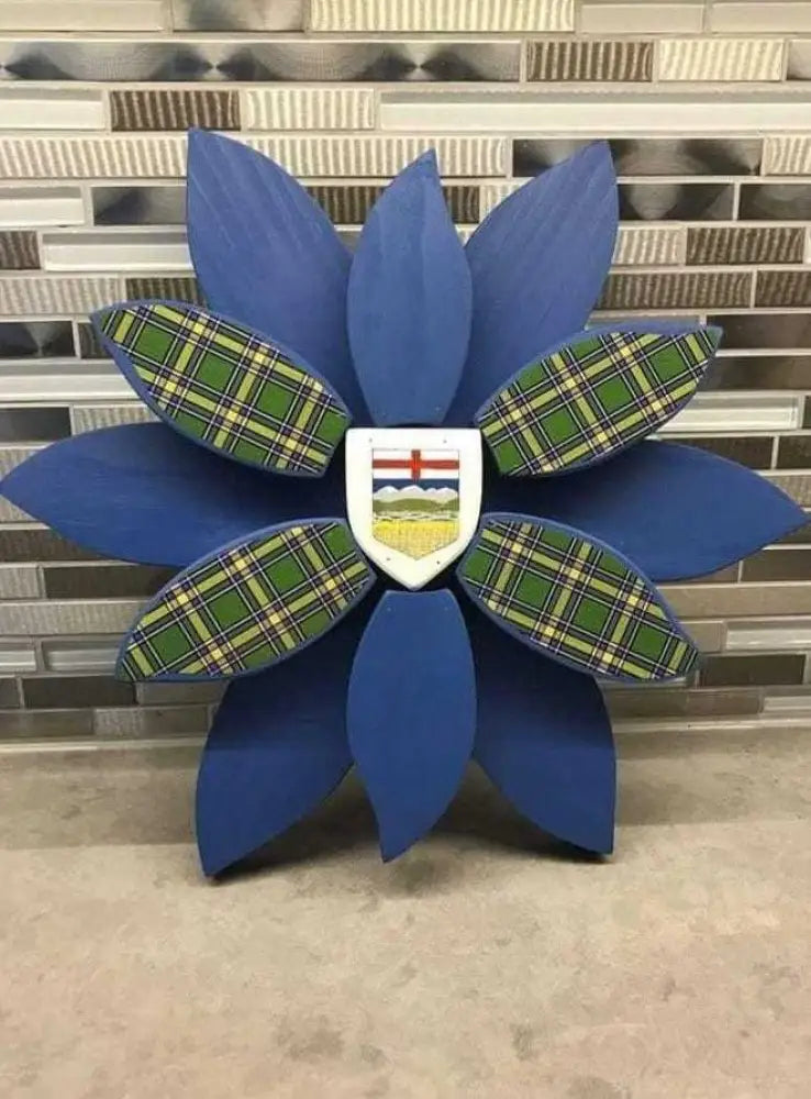 Handcrafted wooden flower art with blue petals and tartan vinyl stickers, suitable for indoor and outdoor decoration.