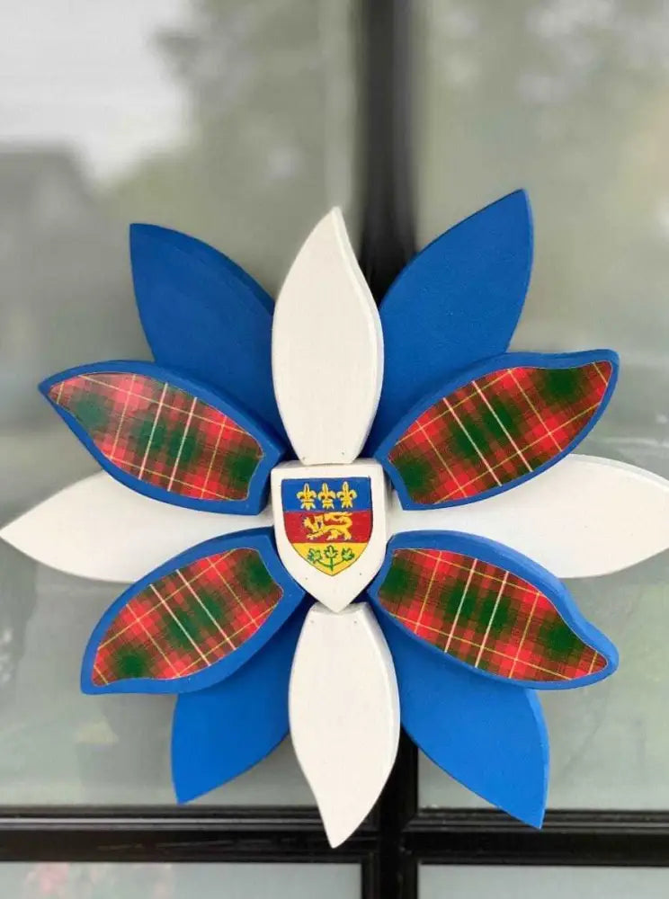 Handcrafted wooden flower art with tartan vinyl details, 12-inch and 24-inch sizes.