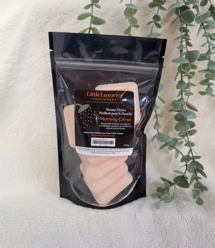 Pack of Morning Citrus shower steamers with pure essential oils in resealable black pouch by Little Luxuries Soapworks