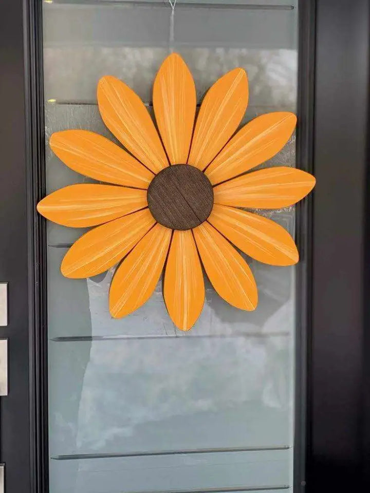 Handcrafted wooden yellow daisy flower wall art supporting Sofia Daisy Campaign for heart health awareness in Canada