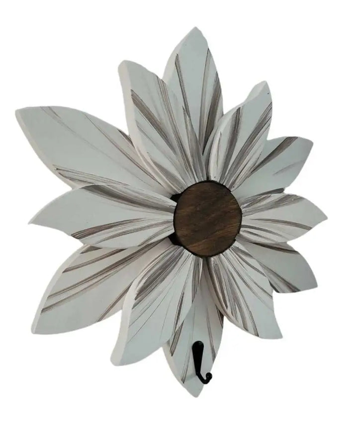 Handcrafted flower wall decoration with intricately painted wooden petals.