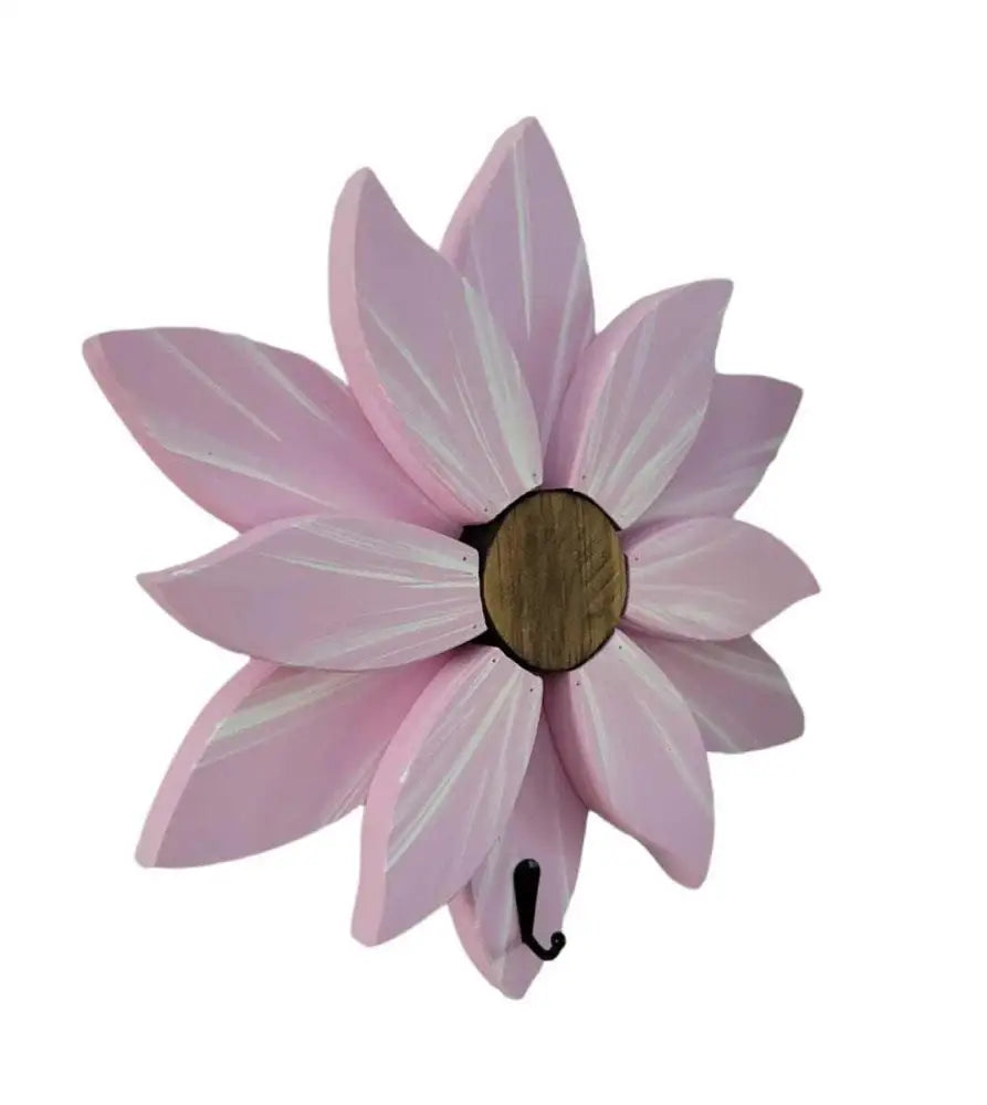 Pink handcrafted flower wall decoration with painted pine petals.