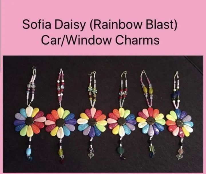 Sofia Daisy Rainbow Blast Charms supporting IWK Foundation with polymer clay petals and glass beads.