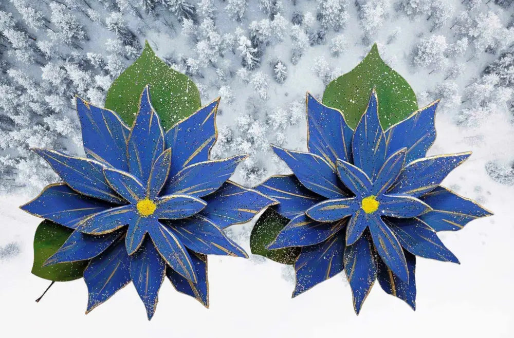 Blue wooden poinsettia flowers with green leaves and snowy background.
