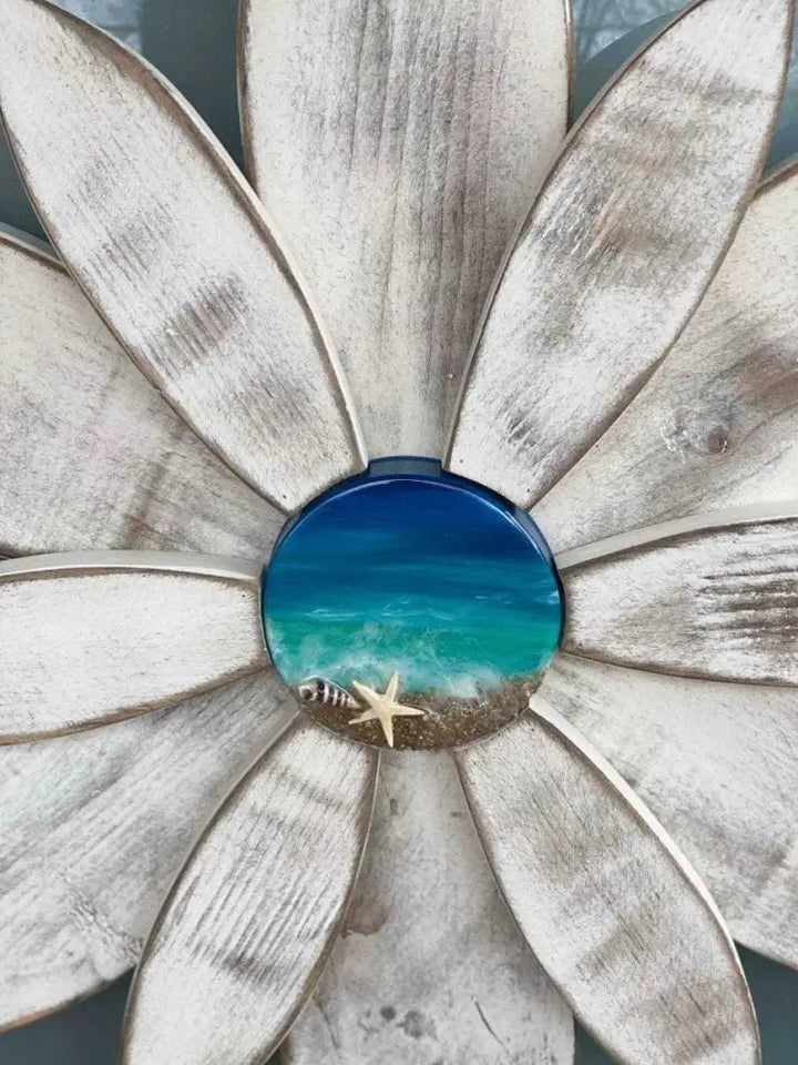 White wooden flower with unique resin ocean-themed center, decorative door design by Woodnwares Nova Scotia.