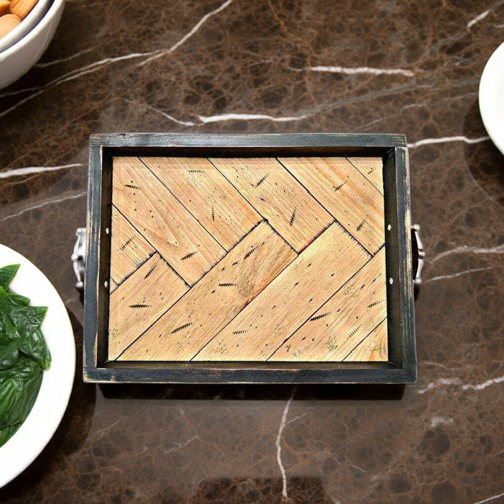 Antiqued herringbone wood tray with elevated feet and brushed copper handles on marble surface