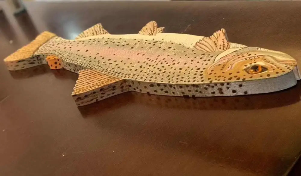 Hand-painted wooden rainbow trout wall art on pine, vibrant and realistic design.