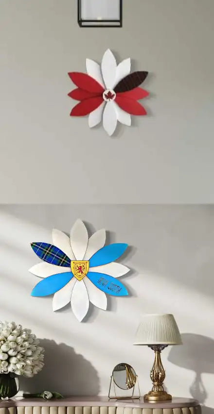 White and blue flower wall art with red, black, yellow plaid center