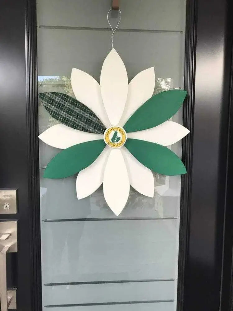 Handcrafted wooden flower door decoration with Cape Breton Tartan design.