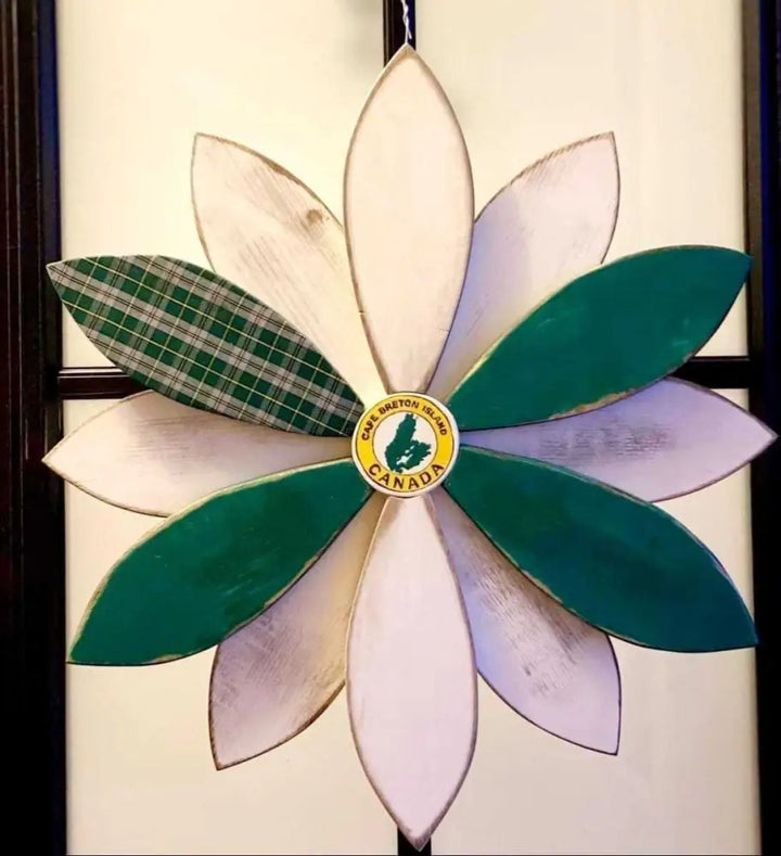 Handcrafted wooden flower art with Cape Breton Tartan design for door decoration.