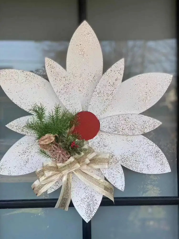Christmas wooden flower door decoration with handmade petals, red center, and festive greenery.