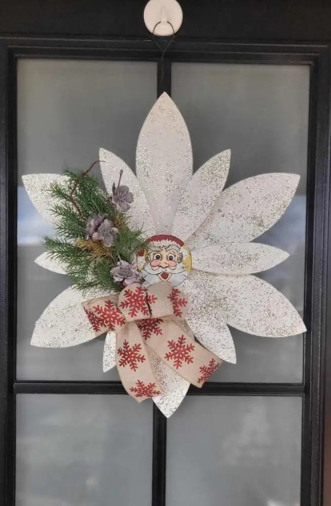 Exquisite Christmas wooden flower door decoration with handmade details and vibrant colors, featuring a wire hanger for indoor or outdoor use.