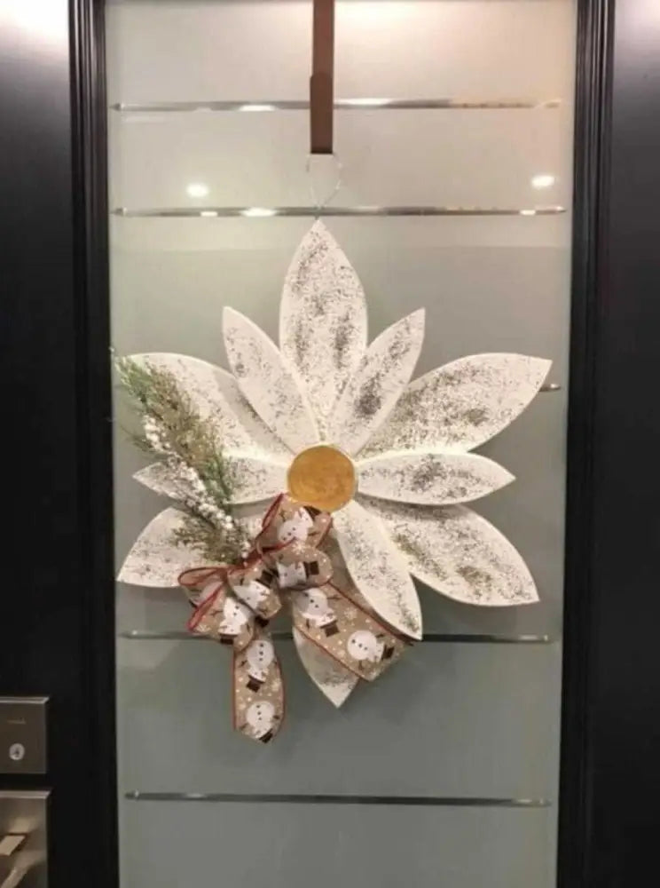 Christmas wooden flower door decoration with handcrafted pine petals and durable wire hanger.