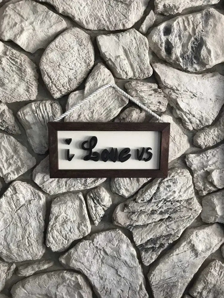 Artisan-crafted wooden sign with "I Love Us" text in a wooden frame, handcrafted with pine, painted for durability, 24 x 11.5 inches, Nova Scotia.