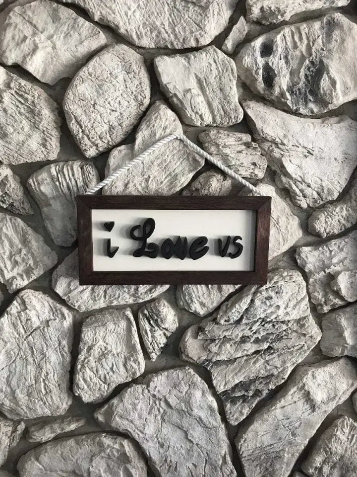 Artisan-crafted wooden sign with "I Love Us" text in a wooden frame, handcrafted with pine, painted for durability, 24 x 11.5 inches, Nova Scotia.